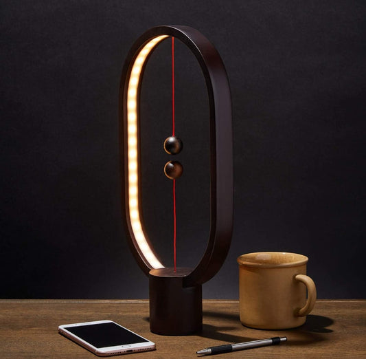 Magnetic Balance LED Desk Lamp – Modern Oval Touch Light